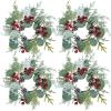 Winlyn 4 Pcs Artificial Frosted Cedar Pine Candle Rings Christmas Candle Holder Rings Wreaths Pine Cones Red Pip Berries Mini Window Mirror Wreaths 14.6″ Wide for Winter Holiday Table Farmhouse Décor(G)