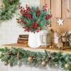 Winlyn 65 Pcs Artificial Pine Branches and Red Berries Stems Christmas Greenery Stems Cedar Picks for Christmas Tree Wreath Winter Wedding Holiday Floral Arrangement Table Centerpiece DIY Crafts