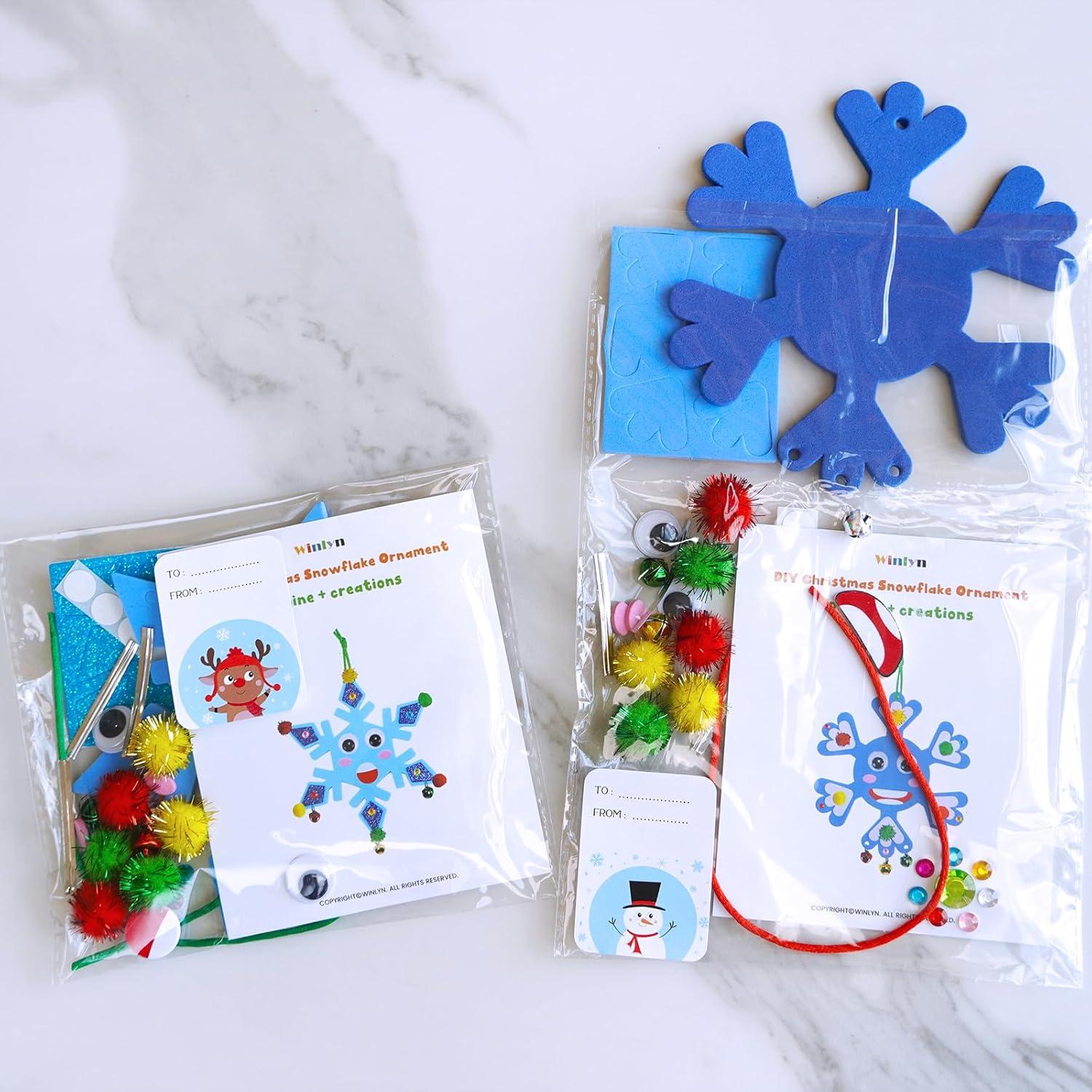 imageWinlyn 24 Sets Christmas Craft Kits Winter Crafts DIY Snowflake Ornaments Decorations Art Sets Foam Snowflakes Smile Stickers Jingel Bells for Kids Holiday Home Classroom Activities Party Favors