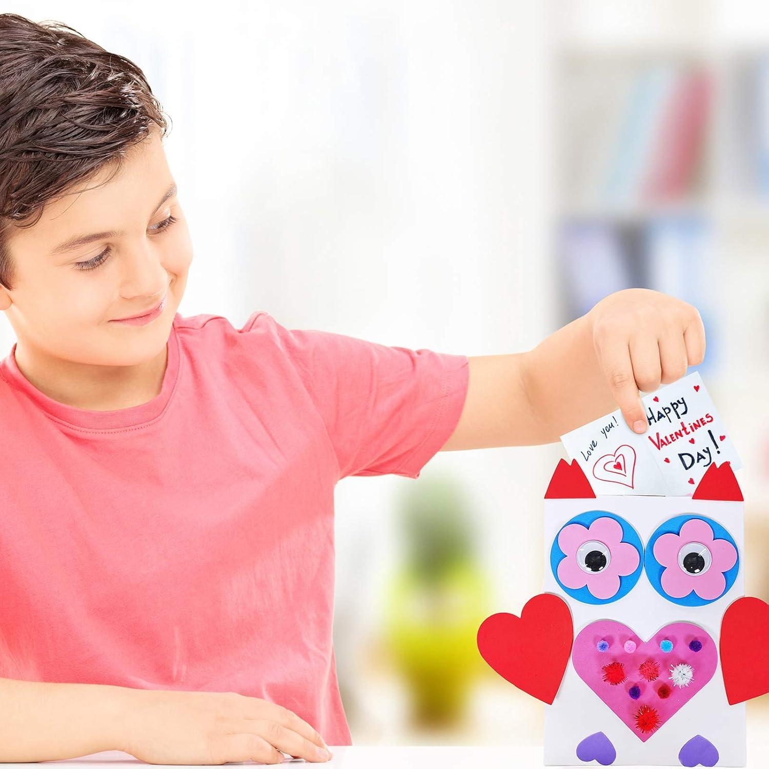 imageWinlyn 12 Sets Bulk Valentines Day Boxes DIY Valentine Owl Mailboxes Cards Holder Boxes Craft Kits White Mailbox with Assorted Heart Cutouts Foam Stickers Pompoms for Kids Classroom Exchange